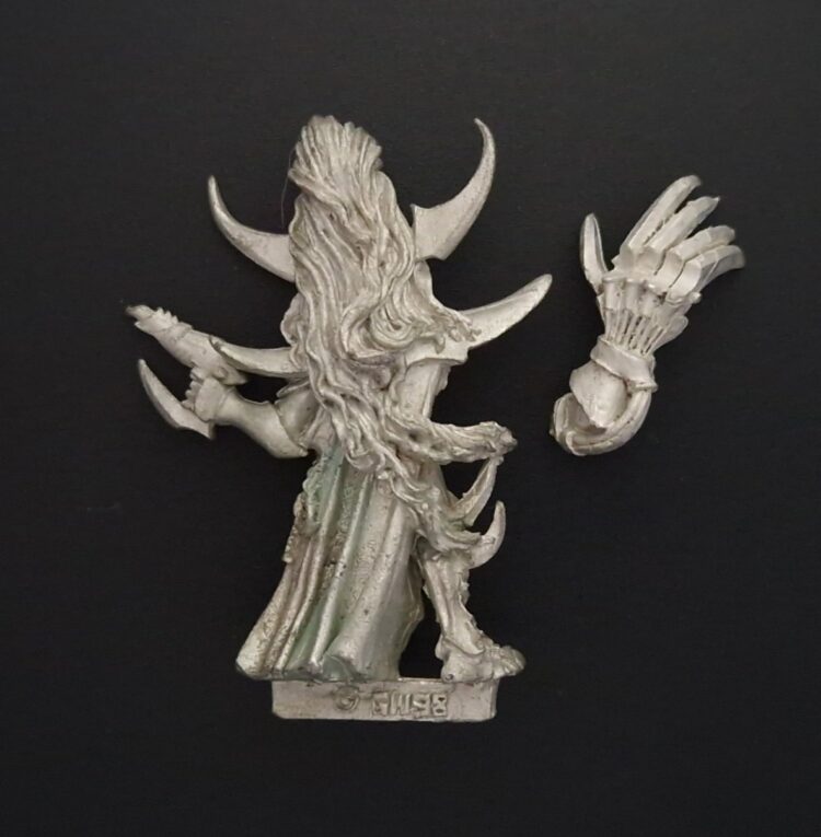 A photo of a 3rd edition Dark Eldar Lord Archon Warhammer miniature