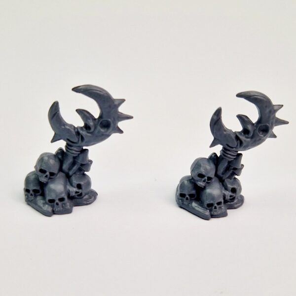 A photo of a Warhammer 7th edtion Battle for Skull Pass Goblin Objective Marker