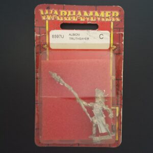 A photo of a Dogs of War Albion Truthsayer Warhammer miniature in blister
