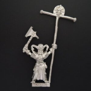 A photo of a 4th edition Undead Skeleton Standard Bearer Warhammer miniature