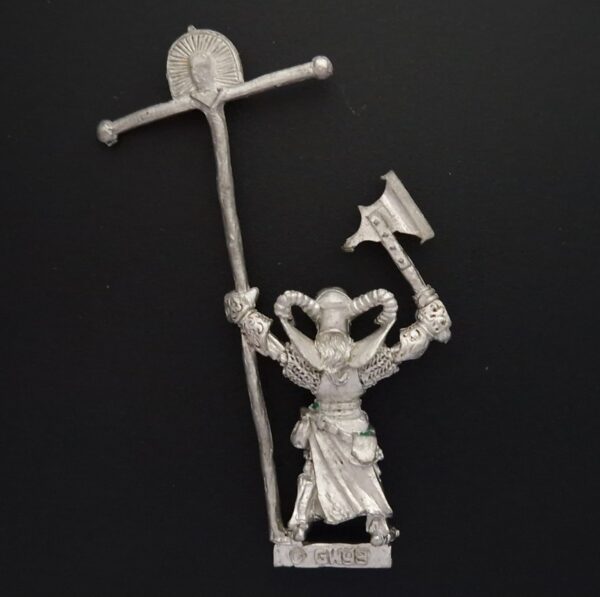 A photo of a 4th edition Undead Skeleton Standard Bearer Warhammer miniature