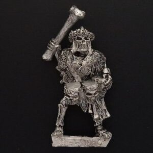 A photo of a 5th edition Vampire Counts Armoured Skeleton Musician Drummer Warhammer miniature