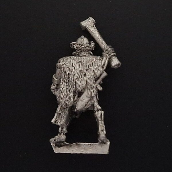 A photo of a 5th edition Vampire Counts Armoured Skeleton Musician Drummer Warhammer miniature
