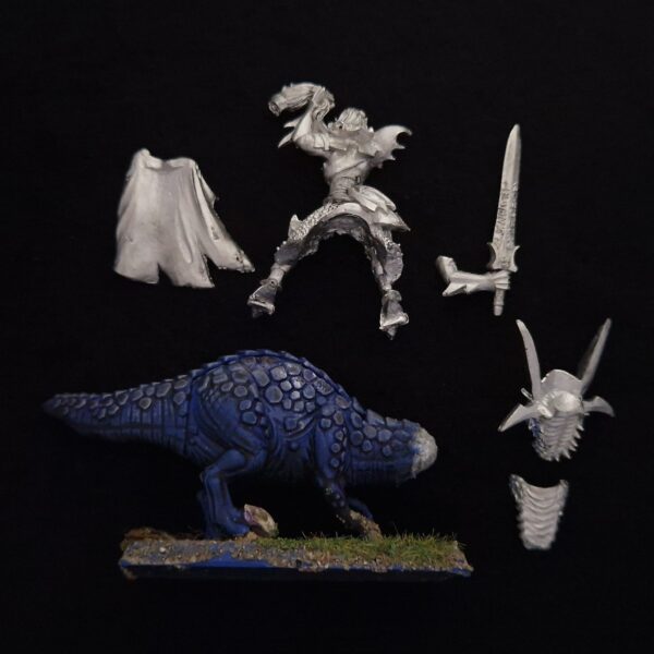 A photo of a 6th edition Dark Elves Malus Darkblade on Cold One Warhammer miniature