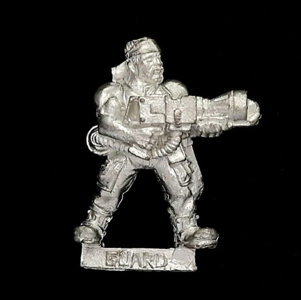 A photo of a 2nd edition Imperial Guard Catachan Jungle Fighters Flamer Warhammer miniature