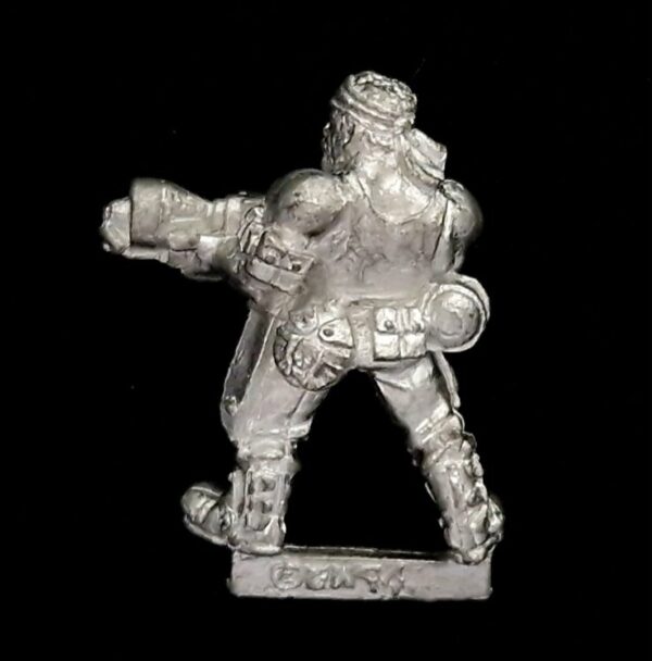 A photo of a 2nd edition Imperial Guard Catachan Jungle Fighters Flamer Warhammer miniature