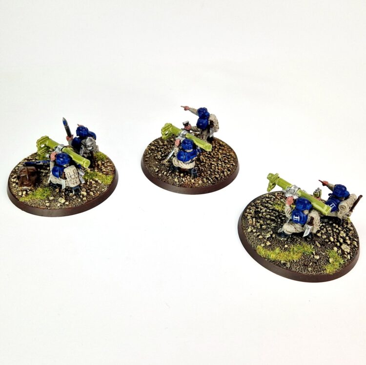 A photo of 3rd edition Imperial Guard Cadian Heavy Weapon Teams Warhammer miniatures