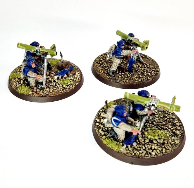 A photo of 3rd edition Imperial Guard Cadian Heavy Weapon Teams Warhammer miniatures