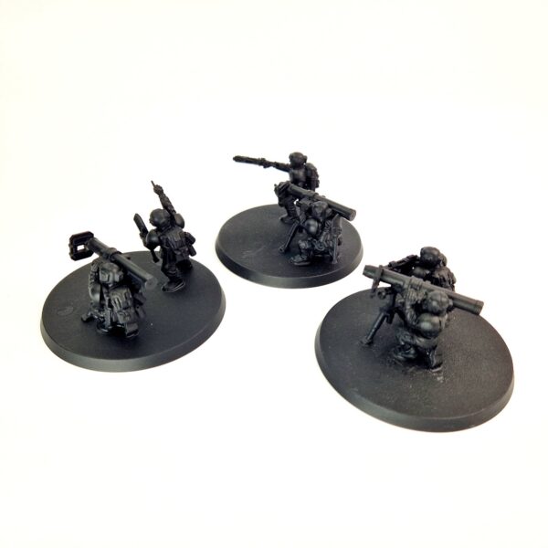 A photo of 3rd edition Imperial Guard Cadian Heavy Weapon Teams Warhammer miniatures