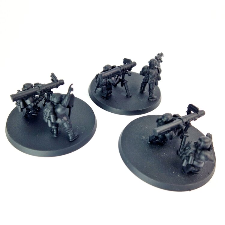 A photo of 3rd edition Imperial Guard Cadian Heavy Weapon Teams Warhammer miniatures