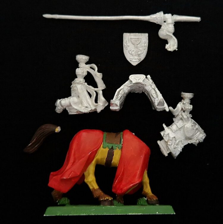 A photo of a Bretonnia Grail Knight Warhammer Miniature