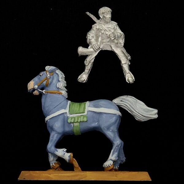 A photo of a Bretonnia Mounted Squire Musician Warhammer Miniature