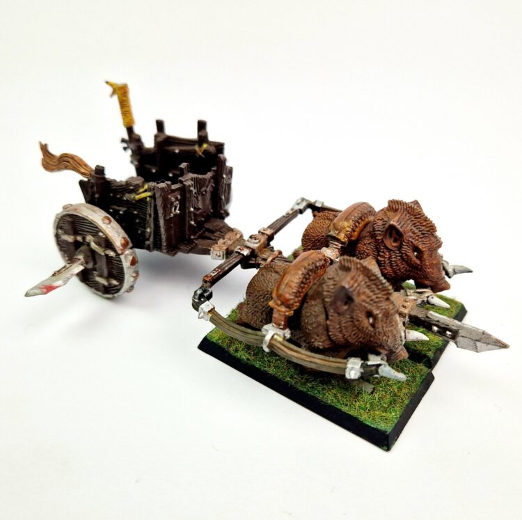 A photo of Orcs and Goblins Orc Boar Chariot Warhammer miniatures