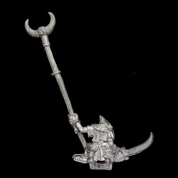 A photo of a Orcs and Goblins Night Goblin Standard Bearer Warhammer miniature