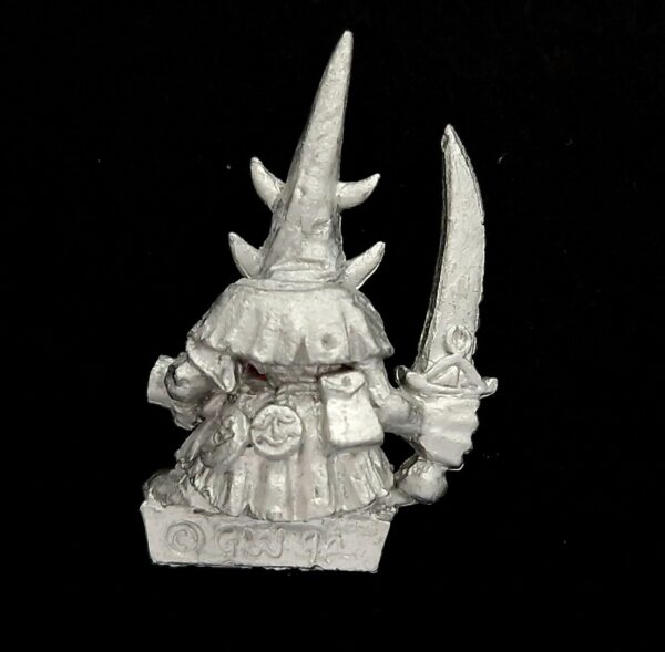 A photo of a Orcs and Goblins Night Goblin Champion Warhammer miniature