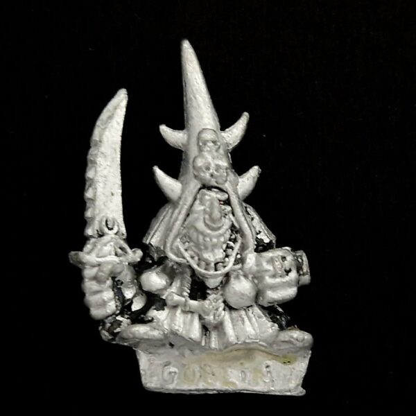 A photo of a Orcs and Goblins Night Goblin Champion Warhammer miniature