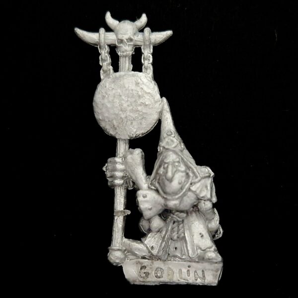 A photo of a Orcs and Goblins Night Goblin Musician Warhammer miniature