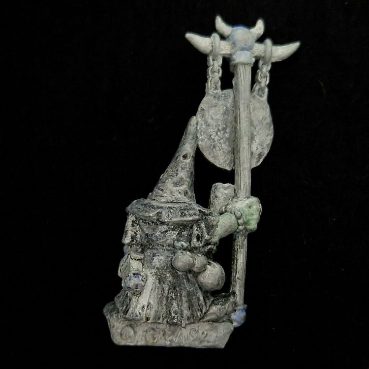 A photo of a Orcs and Goblins Night Goblin Musician Warhammer miniature