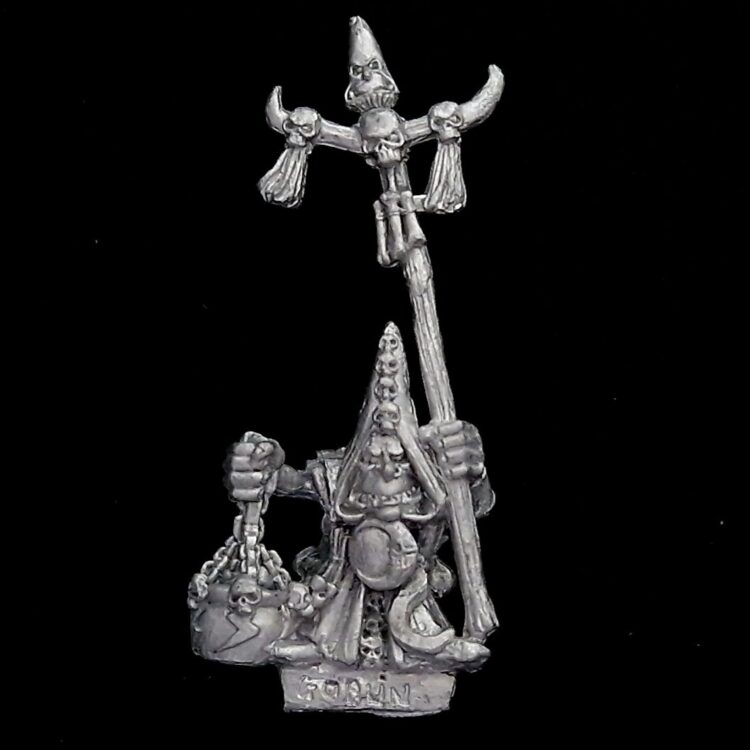 A photo of a Orcs and Goblins Night Goblin Shaman Warhammer miniature