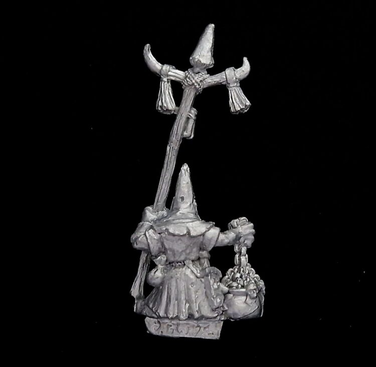 A photo of a Orcs and Goblins Night Goblin Shaman Warhammer miniature