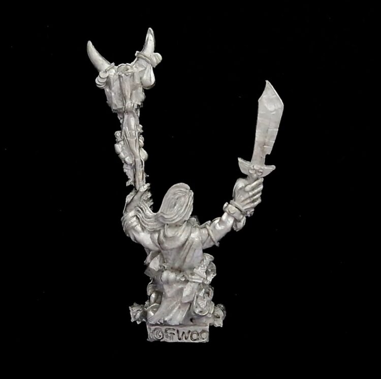 A photo of a Orcs and Goblins Goblin Shaman Warhammer miniature