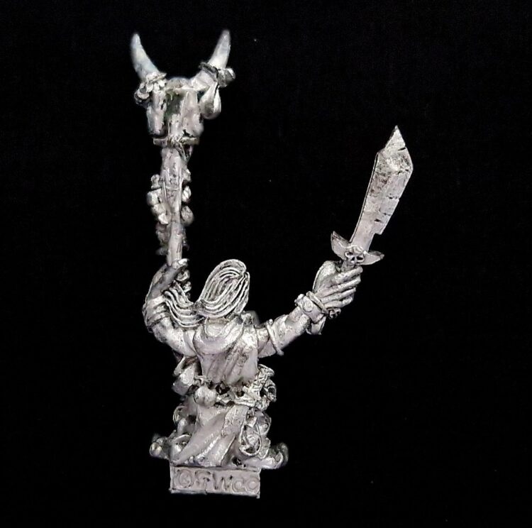 A photo of a Orcs and Goblins Goblin Shaman Warhammer miniature