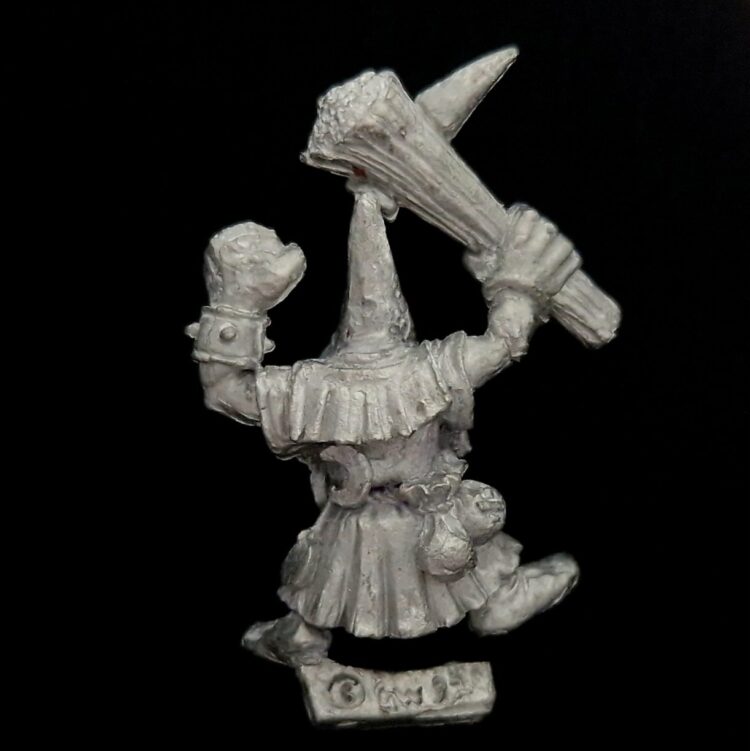 A photo of a Orcs and Goblins Night Goblin Clubber Warhammer miniature