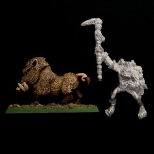 A photo of a Orcs and Goblins Savage Orc Shaman on Boar Warhammer miniature