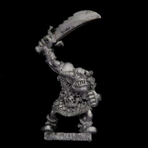 A photo of a Orcs and Goblins Orc Boss Warhammer miniature