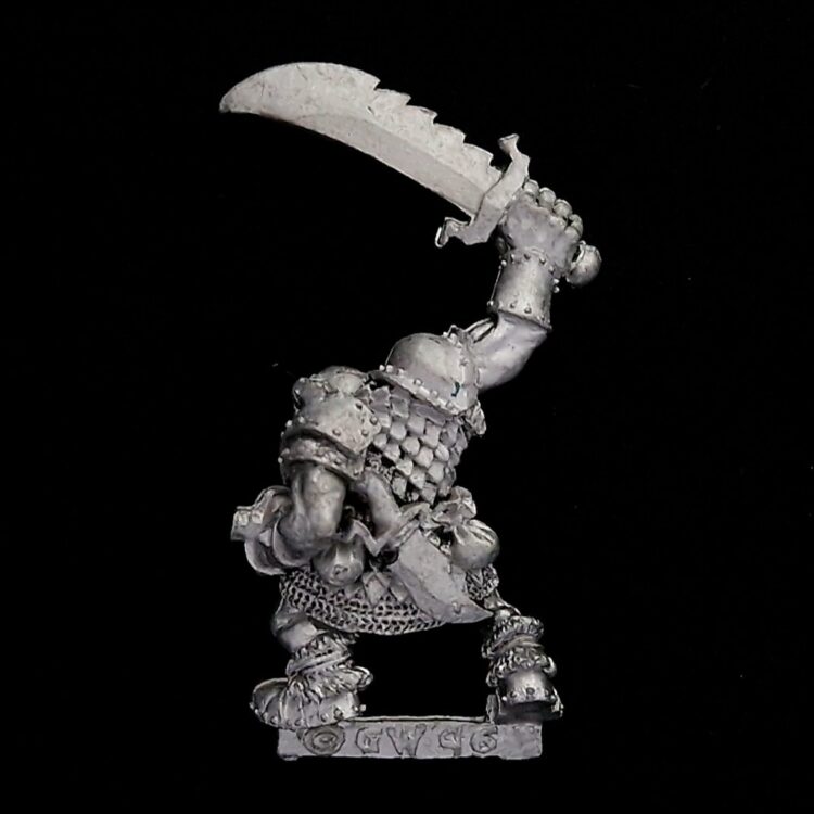 A photo of a Orcs and Goblins Orc Boss Warhammer miniature