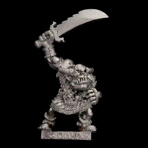 A photo of a Orcs and Goblins Orc Boss Warhammer miniature