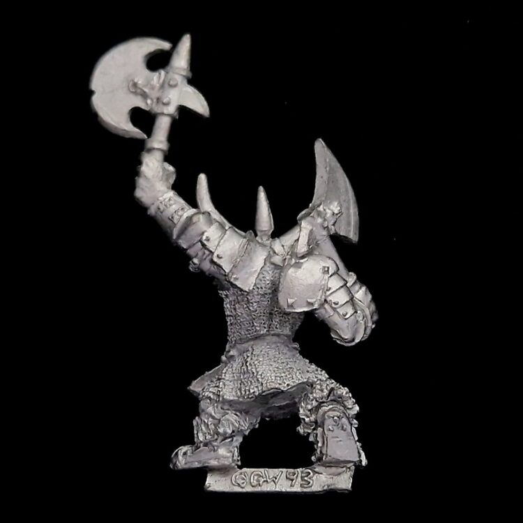 A photo of a Orcs and Goblins Black Orcs Big Boss Warhammer miniature