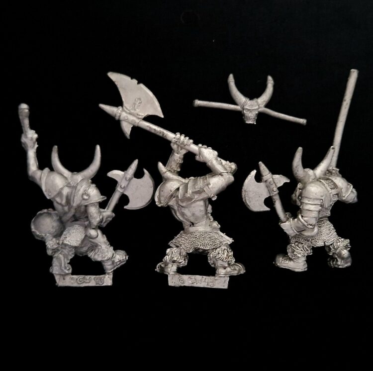 A photo of Orcs and Goblins Black Orcs Command Warhammer miniatures