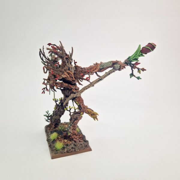 A photo of a Wood Elves Treeman Ancient Warhammer miniature