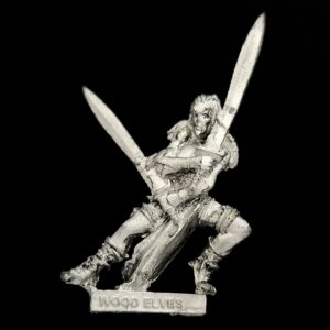 A photo of a Wood Elves Wardancer Warhammer miniature