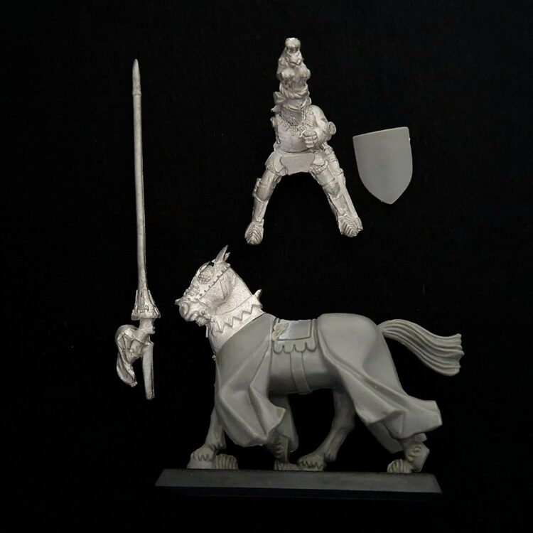 A photo of a Bretonnia Questing Knight Warhammer miniature