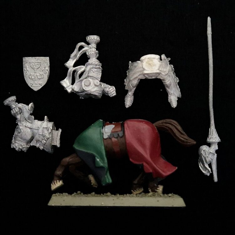 A photo of a Bretonnia Grail Knight Warhammer miniature