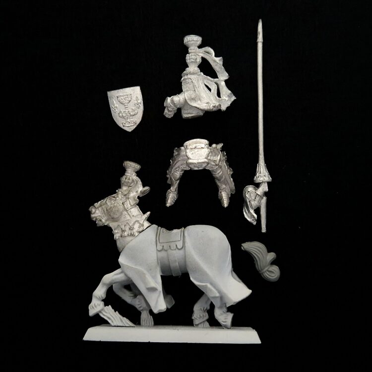 A photo of a Bretonnia Grail Knight Warhammer miniature