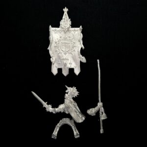 A photo of a Bretonnia Battle Standard Bearer Warhammer miniature