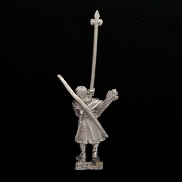 A photo of a Bretonnia Squires with Bows Standard Bearer Warhammer miniature