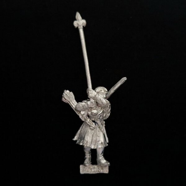 A photo of a Bretonnia Squires with Bows Standard Bearer Warhammer miniature