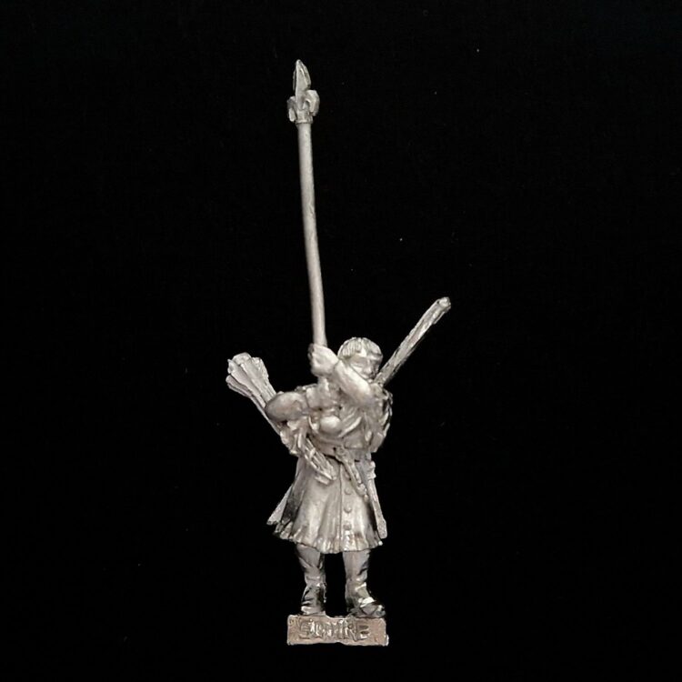 A photo of a Bretonnia Squires with Bows Standard Bearer Warhammer miniature
