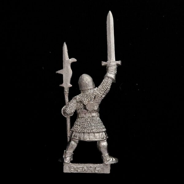 A photo of a Bretonnia Men at Arms Halbediers Champion Warhammer miniature