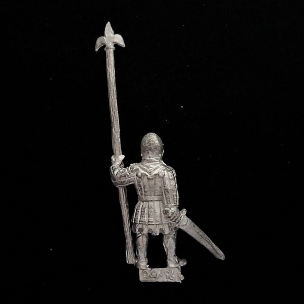 A photo of a Bretonnia Bowmen Standard Bearer Warhammer miniature