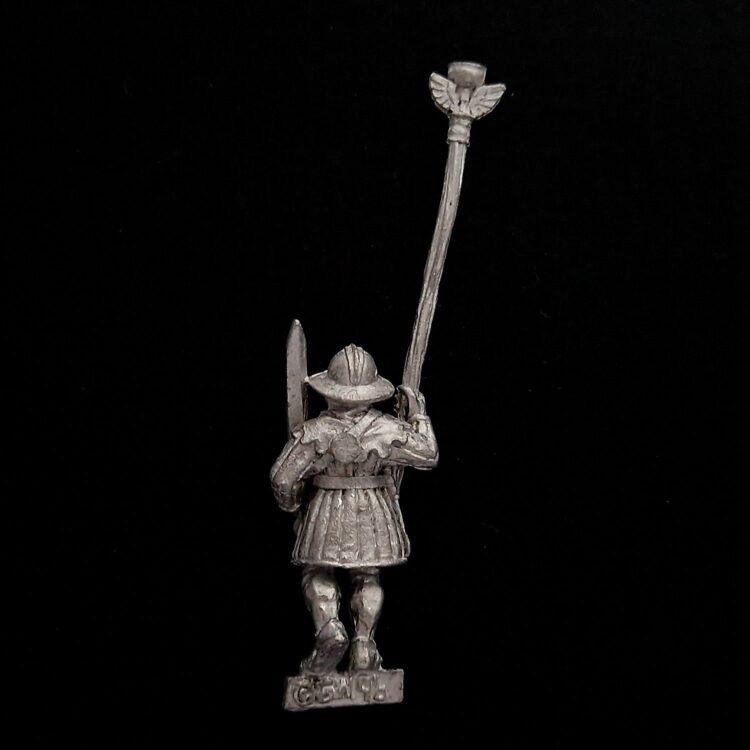 A photo of a Bretonnia Men at Arms Standard Bearer Warhammer miniature