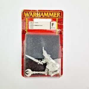 A photo of a High Elves Teclis the Loremaster Warhammer Miniature