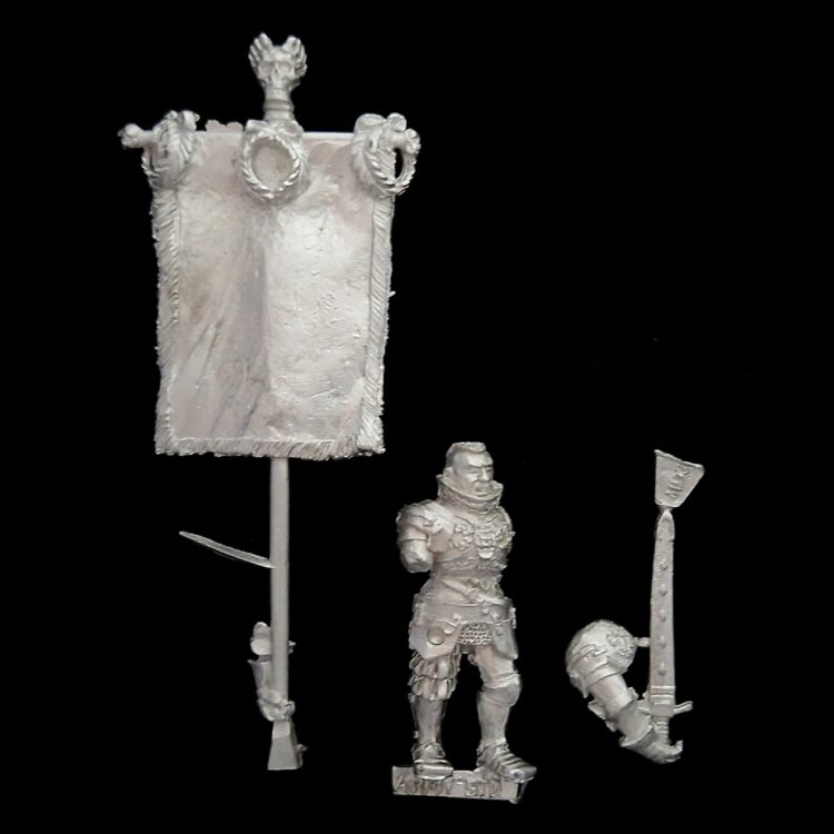 A photo of a The Empire Battle Standard Bearer Warhammer miniature