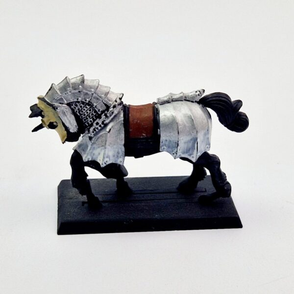 A photo of a The Empire Warrior Priest Ulric Mounted Warhammer miniature