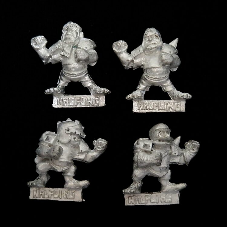 A photo of Blood Bowl Halflings miniatures