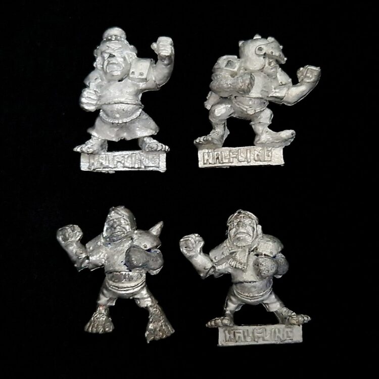 A photo of Blood Bowl Halflings miniatures